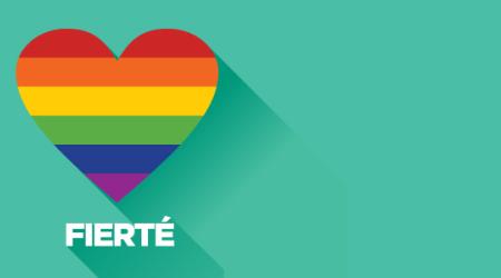 un cœur aux couleurs de la fierté sur fond vert avec le mot fierté en dessous